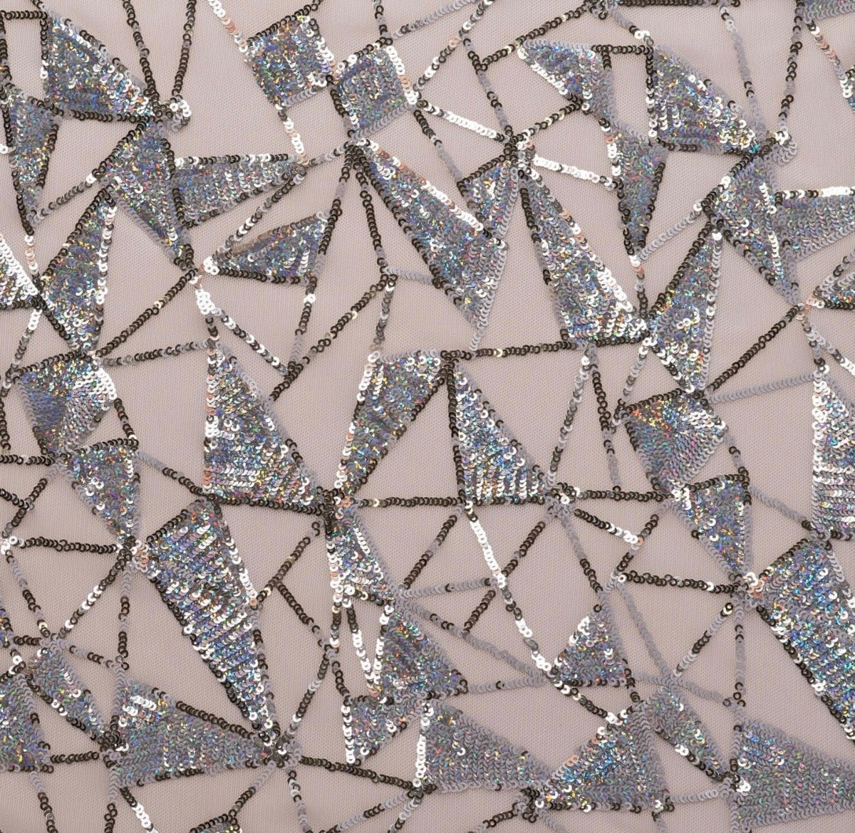 Phural evening gown fabric featuring silver triangular sequins arranged in a geometric pattern with black outlines.