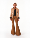 Model wearing the Phural Peacock tailored blazer with flared trousers.