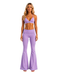 Phural She Did It Anyway Flares in Purple Reign, a high-compression nylon-spandex wide-leg pant with a fold-over waist