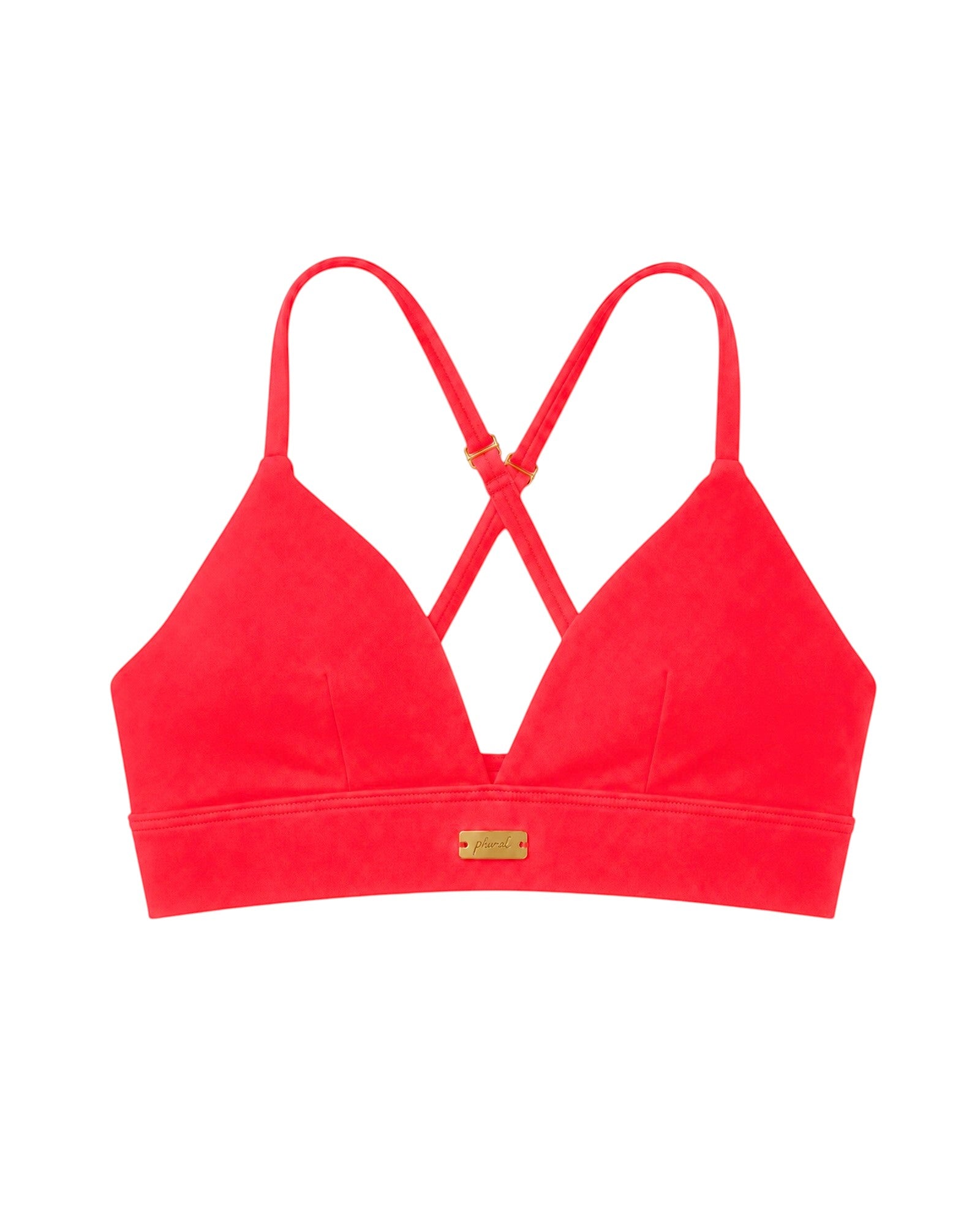 Phural red convertible bra-kini top with gold hardware, worn as a racerback sports bra or bikini top.